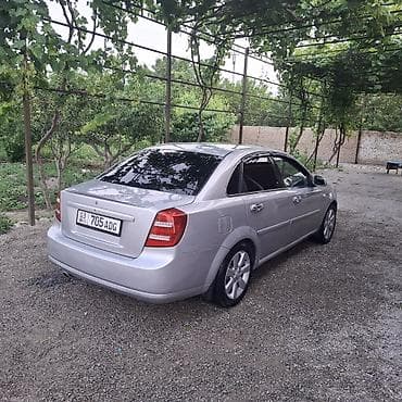 e 55 amg: Седан класса C, серебристый цвет кузова. Компактные размеры и удобная — 5