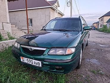 Mazda 626: 1999 г., 1.8 л, Механика, Бензин, Универсал