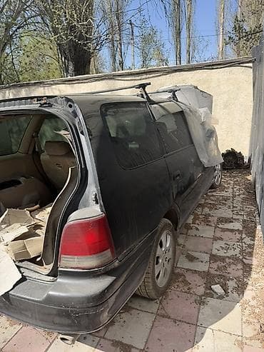 Унаа тетиктери: Минивэн/универсал Odyssey 1998-год. - Кузов: черный, 5‑дверный, задняя — 1