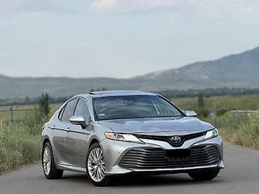 byd e7: Toyota Camry: 2020 г., 2.5 л, Вариатор, Гибрид, Седан — 2