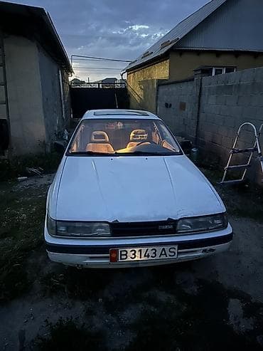 handa fit: Mazda 626: 1989 г., 2 л, Механика, Бензин, Лифтбек — 4