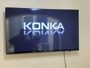 телефизоры бу: Смарт-телевизор KONKA черного цвета с плоским экраном. Оснащен — 1