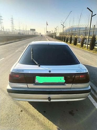 с газом метан: Mazda 626: 1989 г., 2 л, Механика, Газ, Хэтчбэк — 5