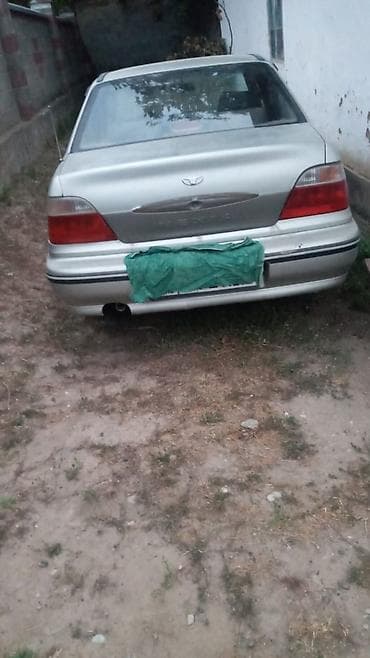 Daewoo Nexia: 2004 г., 1.6 л, Механика, Бензин, Седан