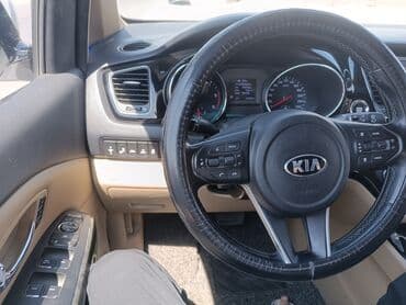 киа сентр: Белый минивэн Kia Carnival Hi-LIMOUSINE с Автомобиль оснащен боковыми — 9