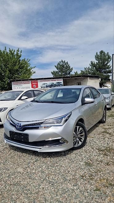 Toyota Corolla: 2019 г., 1.8 л, Робот, Гибрид, Седан — 2