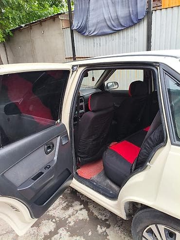 Унаа: Daewoo Nexia: 2010 г., 1.6 л, Кол менен иштөөчү, Бензин, Седан — 6