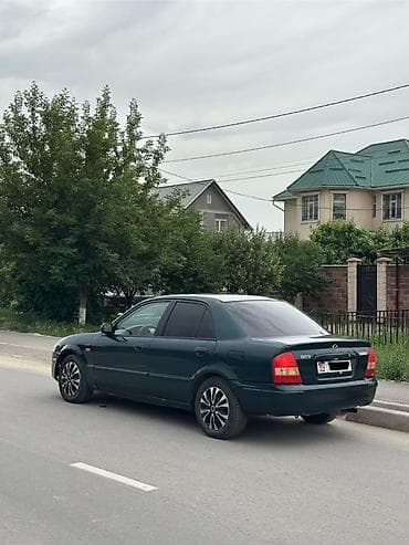 мазда 323 год 2000 капот бампер: Mazda 323: 2000 г., 1.3 л, Механика, Бензин, Седан — 10
