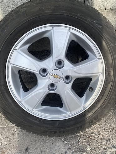 Комплект из 4 легкосплавных дисков Chevrolet с зимними шинами