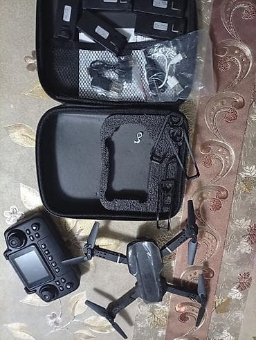 Квадрокоптер с пультом и комплектом аксессуаров Комплектация: -