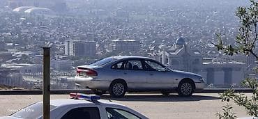Mazda Cronos: 1994 г., 1.8 л, Механика, Бензин, Хэтчбэк
