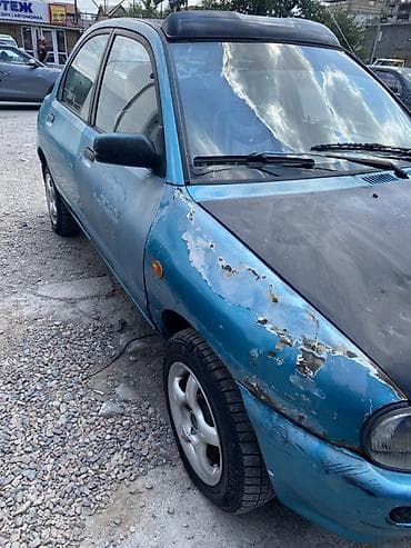 Унаа сатуу: Mazda 121: 1991 г., Кол менен иштөөчү, Бензин, Седан — 3