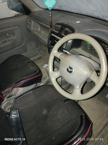 Mazda: Mazda Demio: 2000 г., Автомат, Бензин — 6