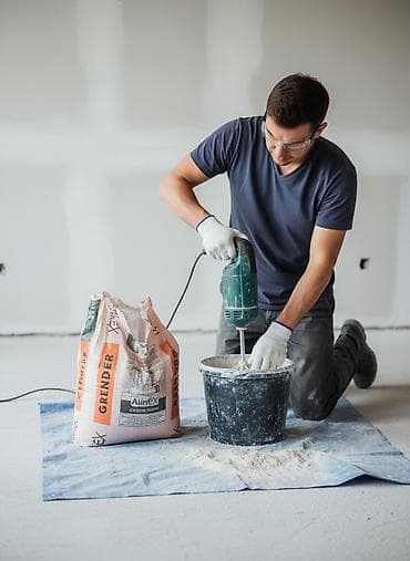 Сухая строительная смесь AlinEX GRENDER, расфасованная в мешки по 30