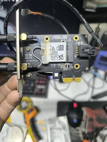 Модемы и сетевое оборудование: Wi‑Fi/Bluetooth адаптер ASUS PCIe - Форм‑фактор: плата расширения PCI — 2