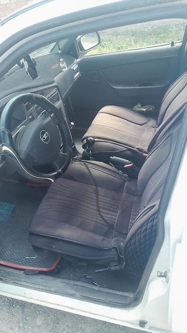 e2 byd: Daewoo Nexia: 2008 г., Механика, Седан — 5