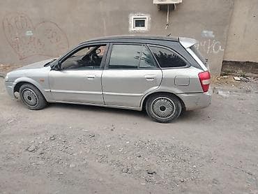 mat: Mazda Familia: 1999 г., 1.5 л, Автомат, Лимузин — 3