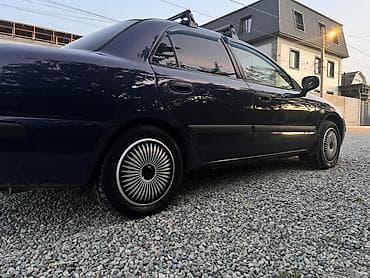 муссо автомобиль: Mitsubishi Carisma: 2000 г., Газ, Седан — 10