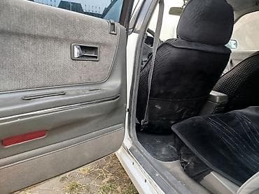 Унаа: Mazda Capella: 1990 г., 2 л, Кол менен иштөөчү, Бензин, Седан — 8