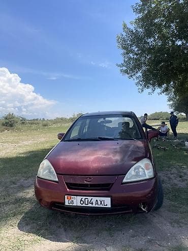 прозада авто: Suzuki Liana: 2001 г., 1.3 л, Механика, Бензин, Универсал — 4