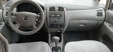 обмен на квартира: Mazda PREMACY: 2000 г., 1.8 л, Автомат, Бензин, Минивэн — 7