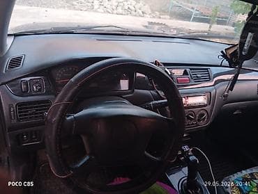 jet ski: Mitsubishi Lancer: 2004 г., 1.6 л, Механика, Бензин, Универсал — 9