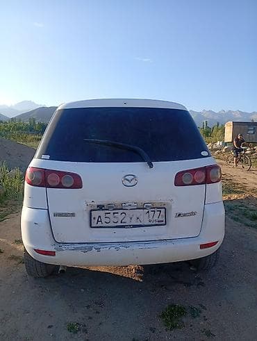 Mazda Demio: 2004 г., Автомат, Хетчбек — 1