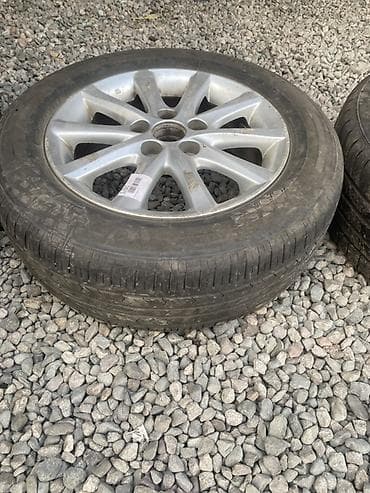 Литой диск с шиной в сборе. Характеристики: - Диаметр диска: 16" -