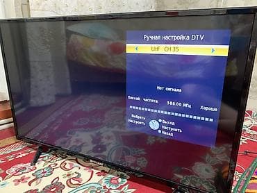 настенный поворотный кронштейн для телевизора: Телевизор Shivaki, диагональ около 42". Плоская LED‑панель с тонкими — 1