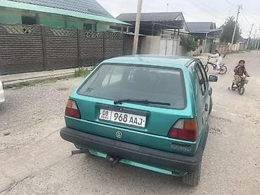 ом: Volkswagen Golf: 1990 г., 1.8 л, Механика, Бензин, Хэтчбэк — 4