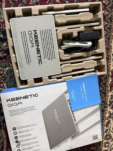 Модемы и сетевое оборудование: Keenetic Giga KN-1010 Двухдиапазонный гигабитный Wi-Fi роутер. Полный — 2