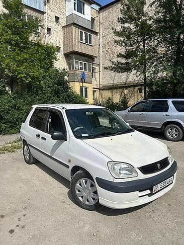 кондидер: Toyota Raum: 2000 г., 1.5 л, Автомат, Бензин, Минивэн — 1