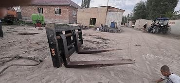 Унаа: Навесные вилы-паллетные для фронтального — 2