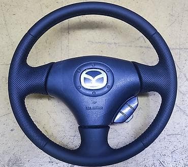 Продается руль с подушкой от Mazda. Подходит на модели: 323, 626 — 1