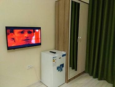 mega hous: Светлая студия с собственной мини-кухней и балконными окнами — 6