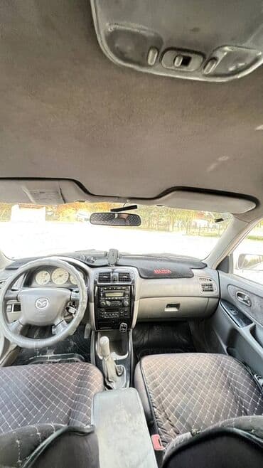 матизге шина: Mazda Capella: 2001 г., Механика, Универсал — 3