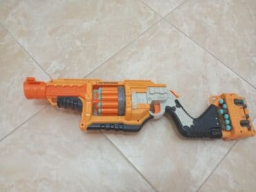 пистолет стреляет орбизами: Бластер NERF Doomlands Lawbringer - Механический револьверный бластер — 7