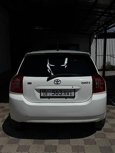 2 8: Toyota Allex: 2003 г., Бензин — 7