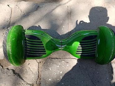 гироскутер батарейка: Гироскутер в ярком зеленом цвете. Оснащен двумя колесами с резиновыми — 3