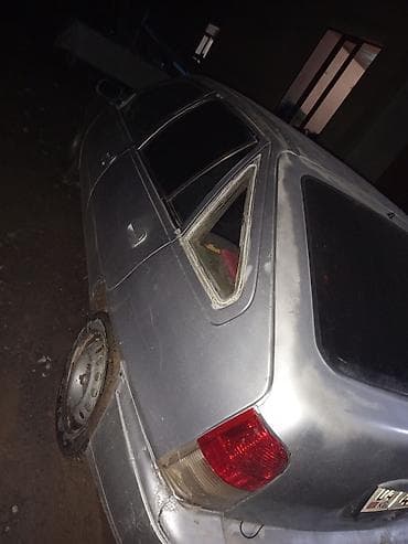 полики для авто: Серебристый пятидверный хэтчбек. Кузов: - 5 дверей, тонированное — 3