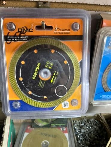 алмазные круги: Отрезной диск Doberman диаметром 125 мм для угловых шлифовальных — 1