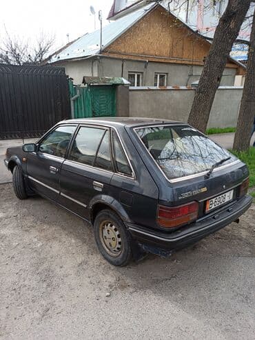 садовый измелчитель: Mazda 323: 1987 г., 1.7 л, Механика, Дизель — 4