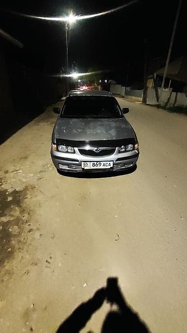 odyssey 2002: Mazda 626: 1998 г., 1.8 л, Ручные, Бензин, Седан — 1