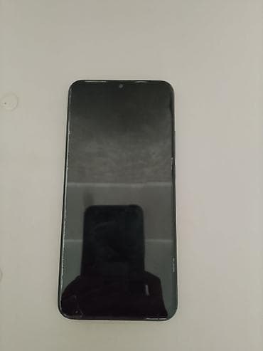 апарат для сок: Смартфон Redmi (серия Redmi 9) в тёмном цвете. Ключевые особенности — 4
