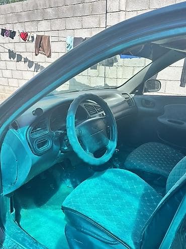 полик bmw: Daewoo Lanos: 1999 г., 1.6 л, Механика, Бензин, Седан — 1