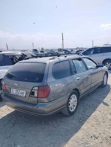 255 55 18: Nissan Primera: 2001 г., 2 л, Автомат, Газ, Универсал — 6