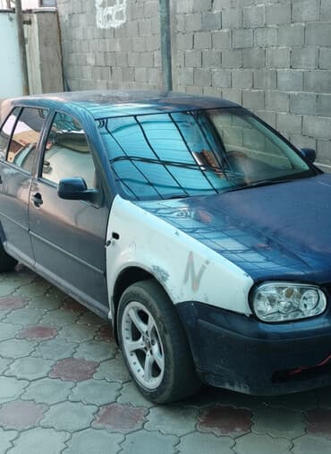 авто с последующим выкупом без первоначального взноса: Volkswagen Golf IV, хэтчбек 3‑дверный, темно‑синий. Основные — 1
