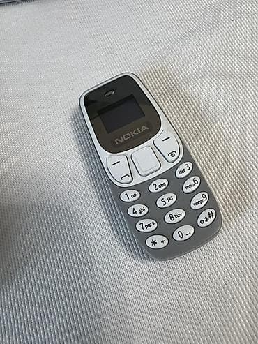 Мини-телефон B M10 (Miniphone) — сверхкомпактная трубка для звонков и