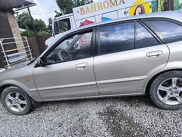 авто сокулук: Mazda 323: 2003 г., 1.6 л, Кол менен иштөөчү, Бензин, Хетчбек — 4