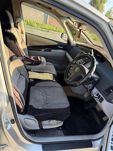 Toyota Raum: 2002 г., Автомат, Бензин, Минивэн — 5